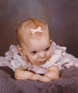 Heather Madsen, writer and public speaker about caregiving, as infant.