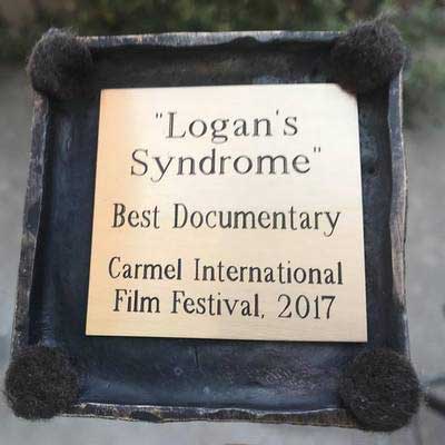 Reviews of LOGAN'S SYNDROME, Award-Winning Best Documentary, Trophy Text and Reviews