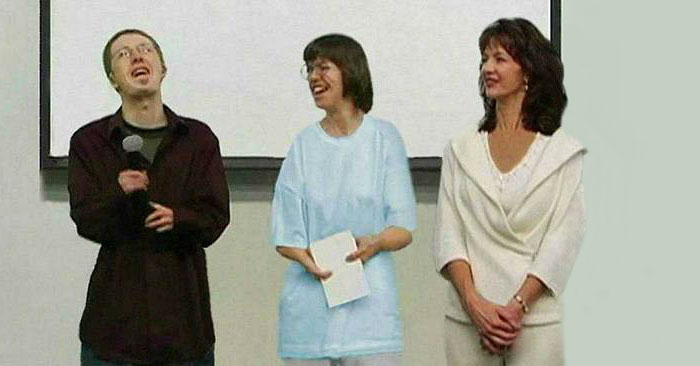 Debbie, Heather, and Logan speaking to medical students